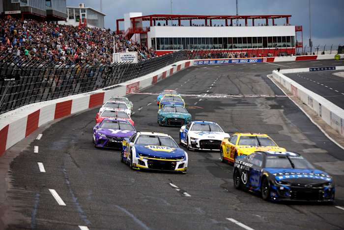 Daniel Suarez, Chase Elliott, Joey Logano and Denny Hamlin race during qualifying heat race #1 for the NASCAR Cup Series All-Star Race at North Wilkesboro Speedway. (Photo by Sean Gardner/Getty Images)